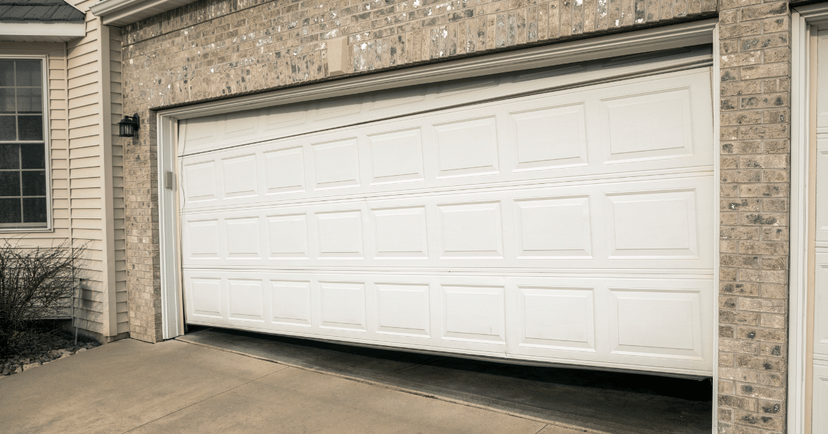 One side of garage door is higher than the other